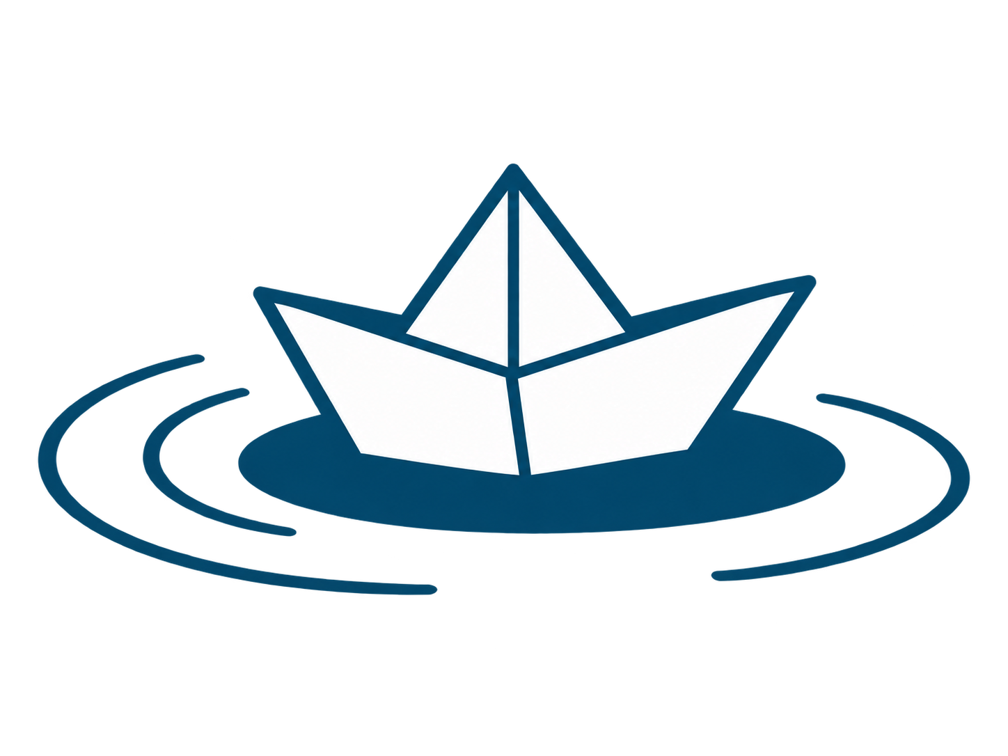 Paper boat floating on a puddle
